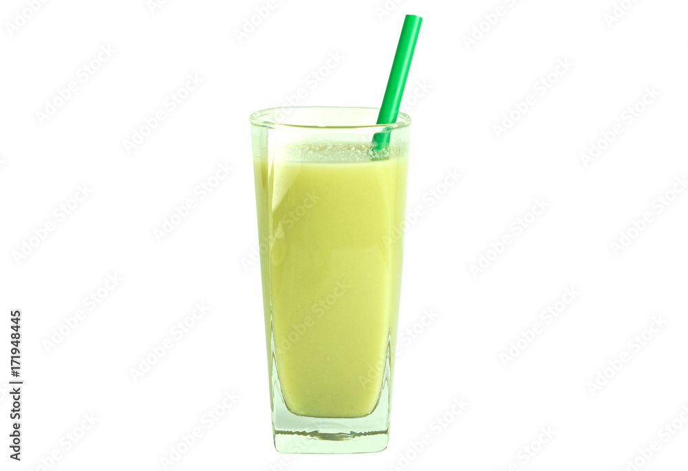 Healthy green smoothie with green straw in a clear tall glass isolated on white Healthy green smoothie with green straw in a clear tall glass isolated on white
