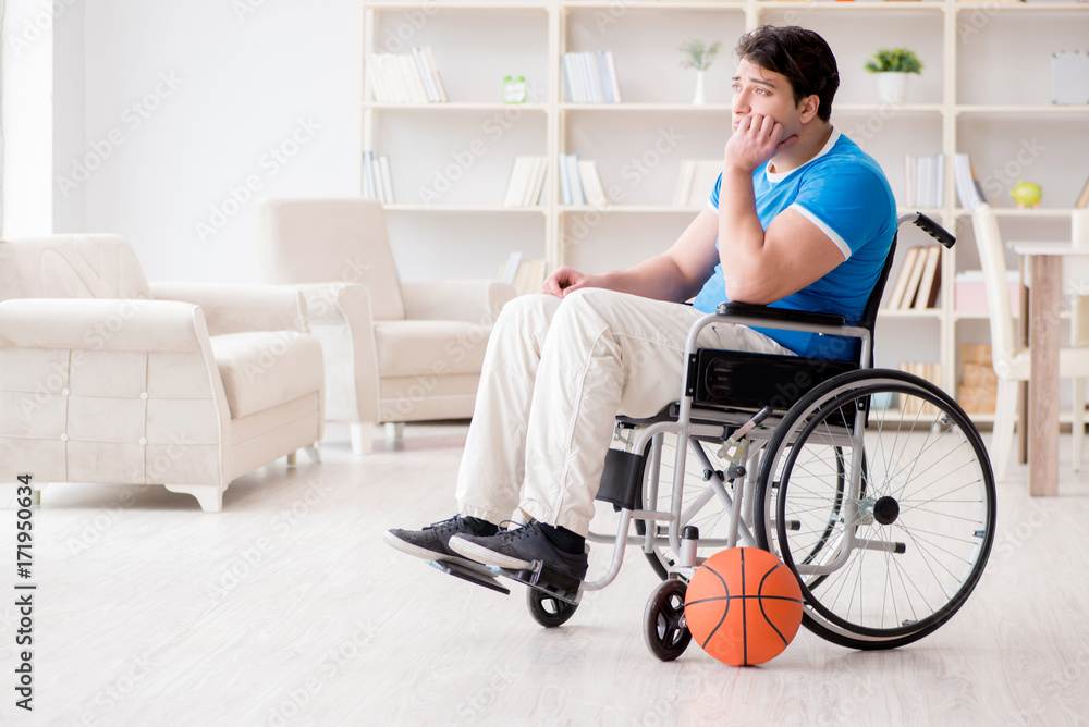Young basketball player on wheelchair recovering from injury Young basketball player on wheelchair recovering from injury