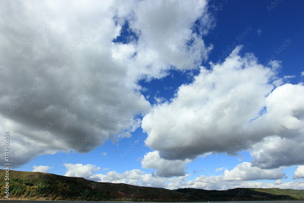 landscape with clouds on blue sky landscape with clouds on blue sky
