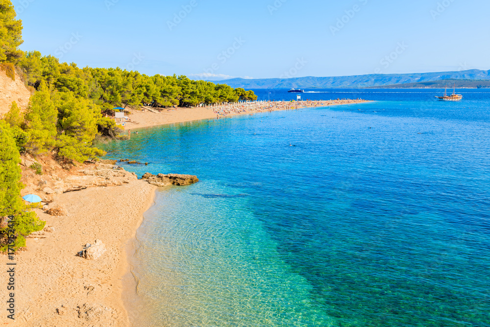 View of famous Zlatni Rat beach with beautiful sea water in Bol town, Brac island, Croatia