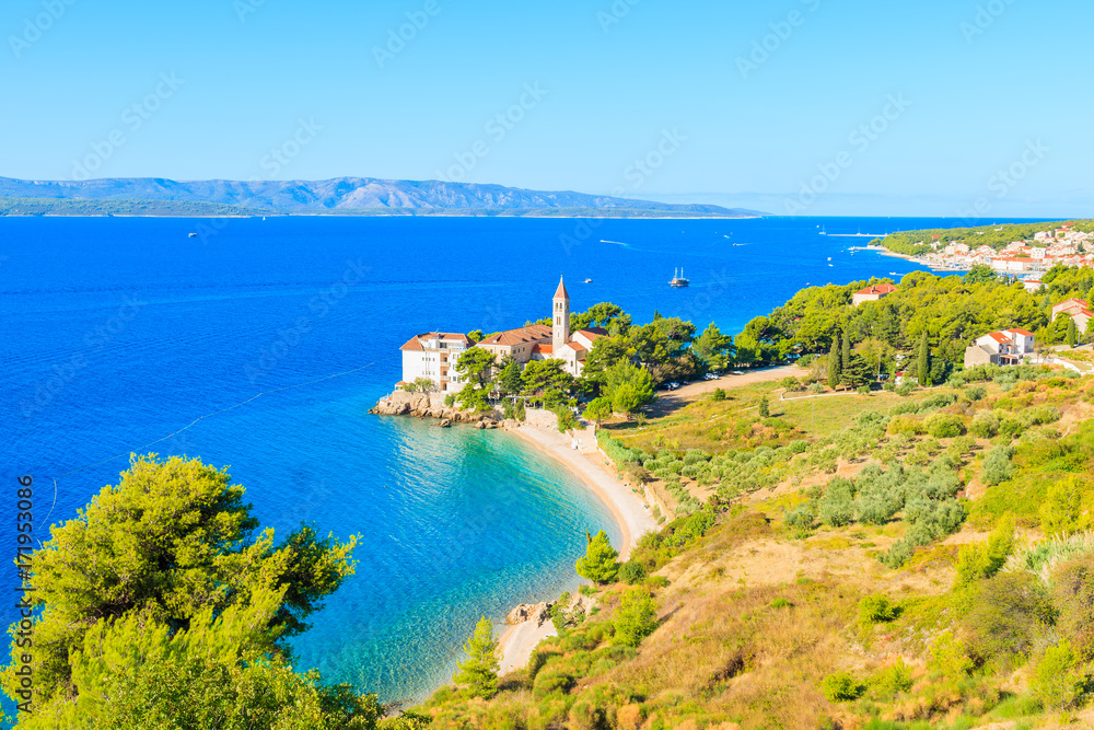 Naklejka premium View of beautiful bay with beach and Dominican monastery in Bol town, Brac island, Croatia