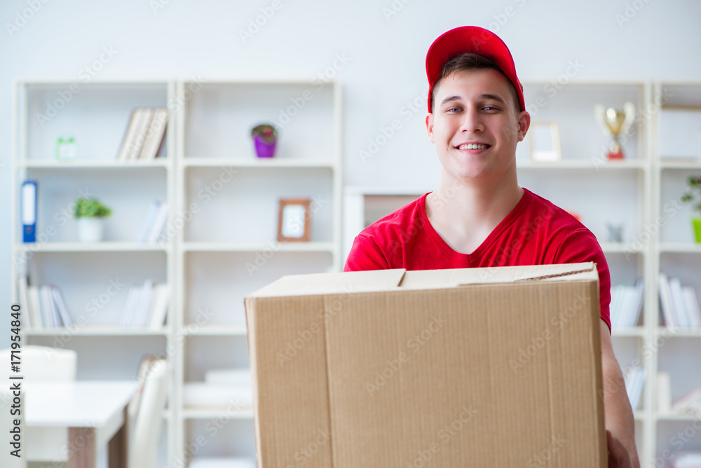 Post man delivering a parcel package Post man delivering a parcel package