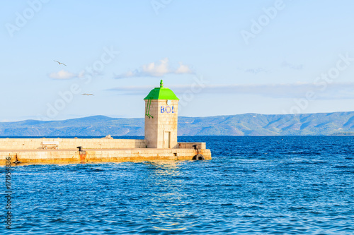 Pier of Bol - entrance to Bol port from open sea, Brac island, Croatia