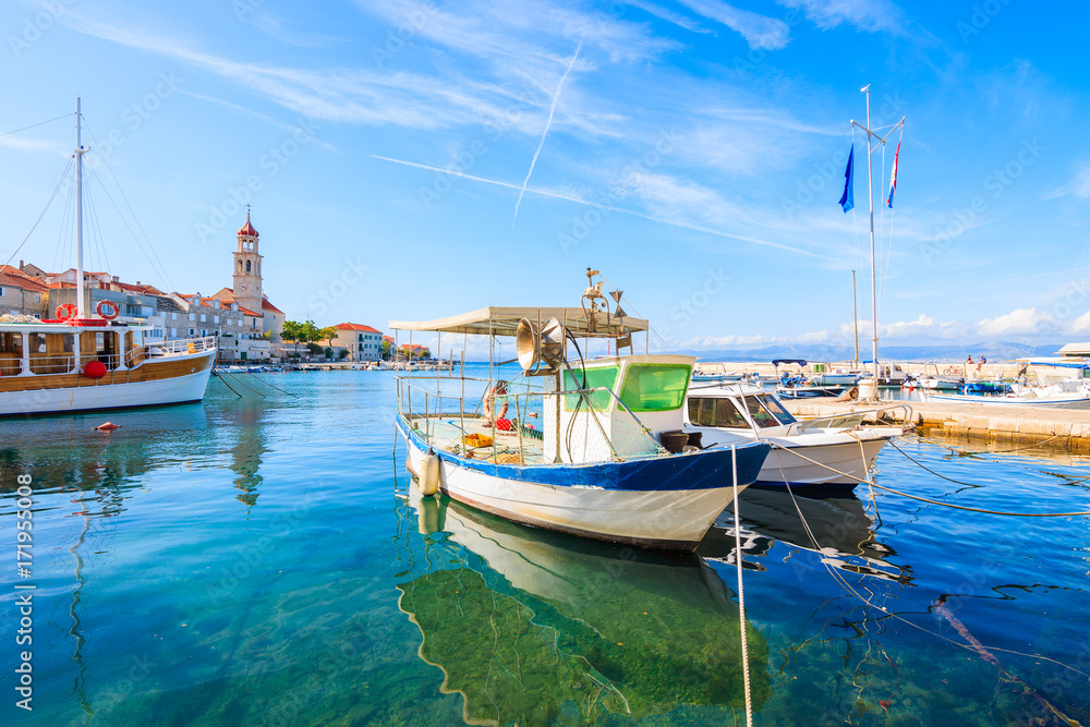 Fishing boats anchoring in beautiful Sutivan port, Brac island, Croatia