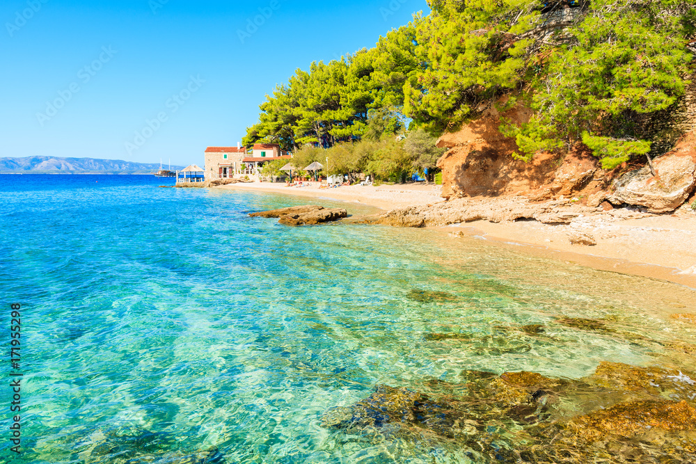 Obraz premium Sea bay and beach with turquoise crystal clear water in Bol town, Brac island, Croatia