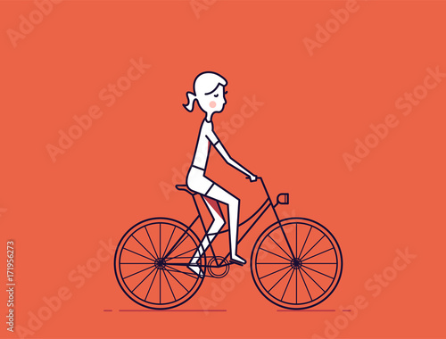 Fototapeta Naklejka Na Ścianę i Meble -  Girl riding a bike