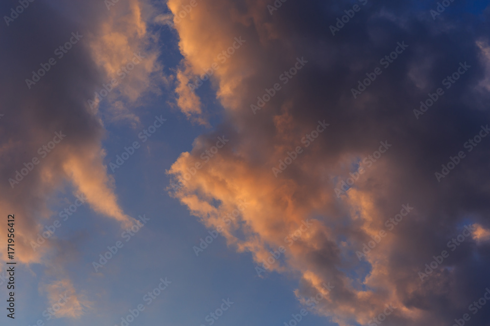 Dramatic sunset clouds background