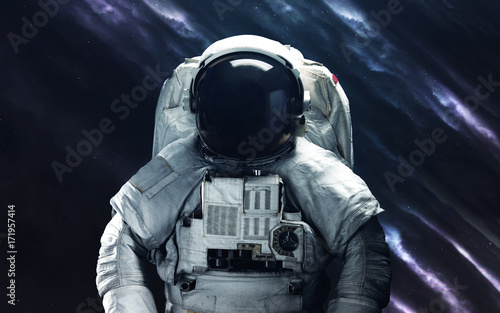 Fototapeta Naklejka Na Ścianę i Meble -  Astronaut. Deep space image, science fiction fantasy in high resolution ideal for wallpaper and print. Elements of this image furnished by NASA