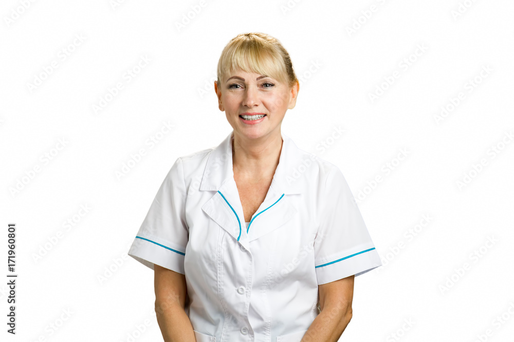 Portrait of friendly female doctor. Smiling mature nurse or doctor standing on white background. Portrait of friendly female doctor. Smiling mature nurse or doctor standing on white background.