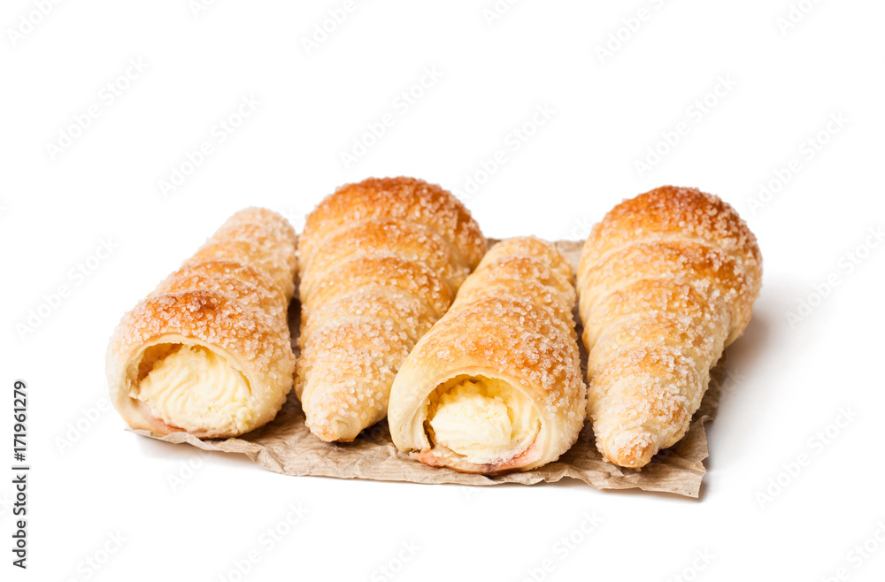 Puff  pastry horns isolated on white