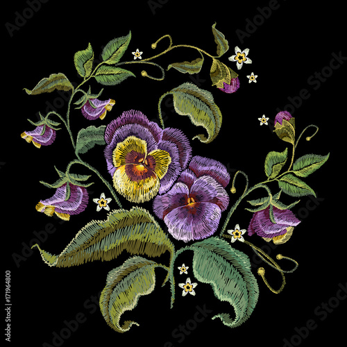Violets flower embroidery. Fashionable design of clothes, t-shirt design. Classical embroidery beautiful flowers of violet on black background