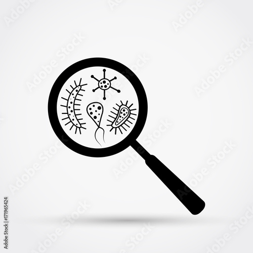 Germs and bacteria under the magnifying glass vector illustration.