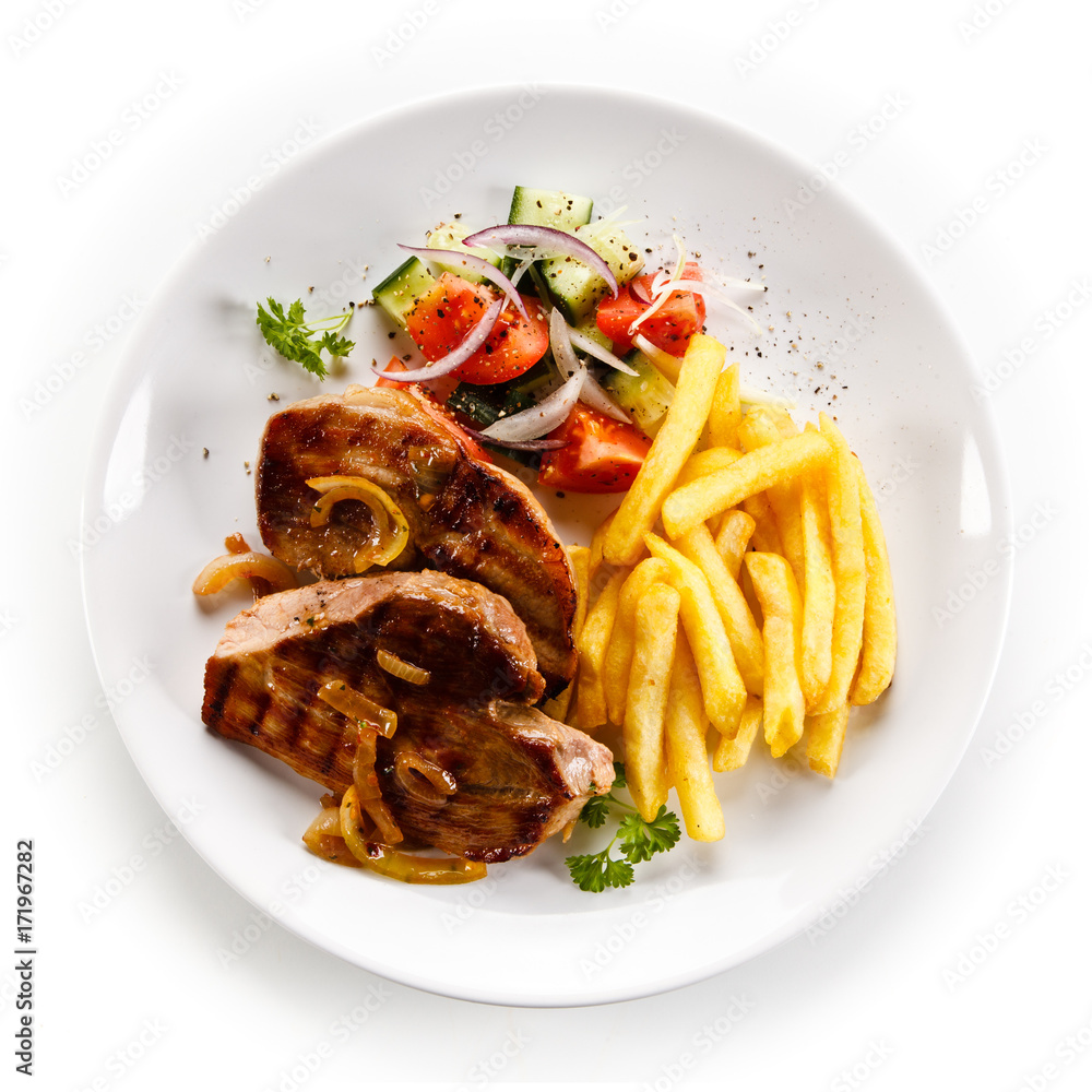 Grilled beefsteak with french fries on white background 