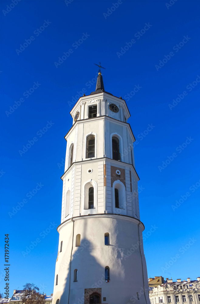 Vilnius, Lithuania. Close Up View Of Bell Tower Of Cathedral Basilica Of St. Stanislaus And St. Vladislav On Cathedral Square Vilnius, Lithuania. Close Up View Of Bell Tower Of Cathedral Basilica Of St. Stanislaus And St. Vladislav On Cathedral Square