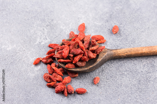 Goji berry on a concrete background photo