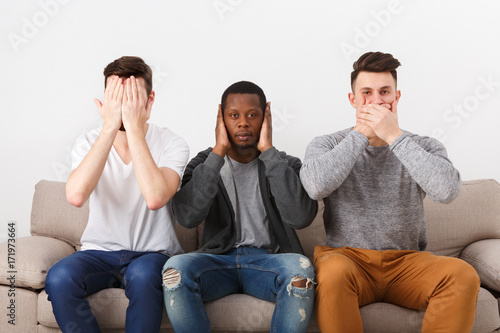 Photography Three wise monkey scene showed by young men in casual