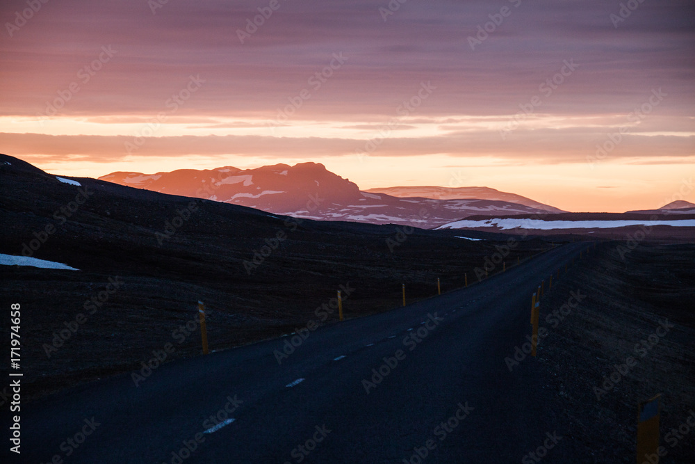 A drive with a breathtaking sunset at midnight 