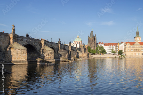 Charles Bridge (Karluv most), Vltava River, Old Town Bridge Tower and other old buildings at the Old Town in Prague, Czech Republic.