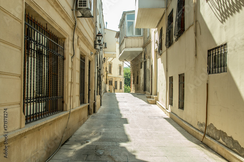 Narrow old classic empty street in Old City of Baku - Icheri Sheher.