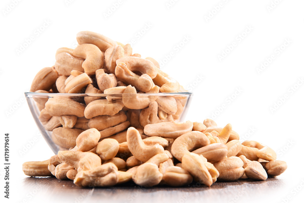 Bowl with cashew nuts isolated on white Bowl with cashew nuts isolated on white
