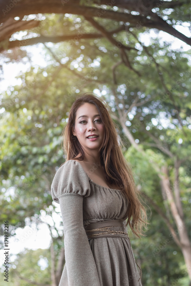 Portrait art of beautiful women in nature park background Portrait art of beautiful women in nature park background