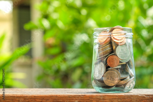 save money for investment concept coin baht thai in the glass jar