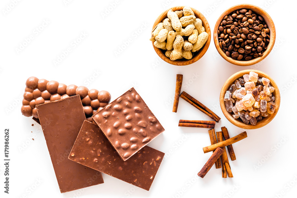 Ingredients for chocolates on white background top view Ingredients for chocolates on white background top view