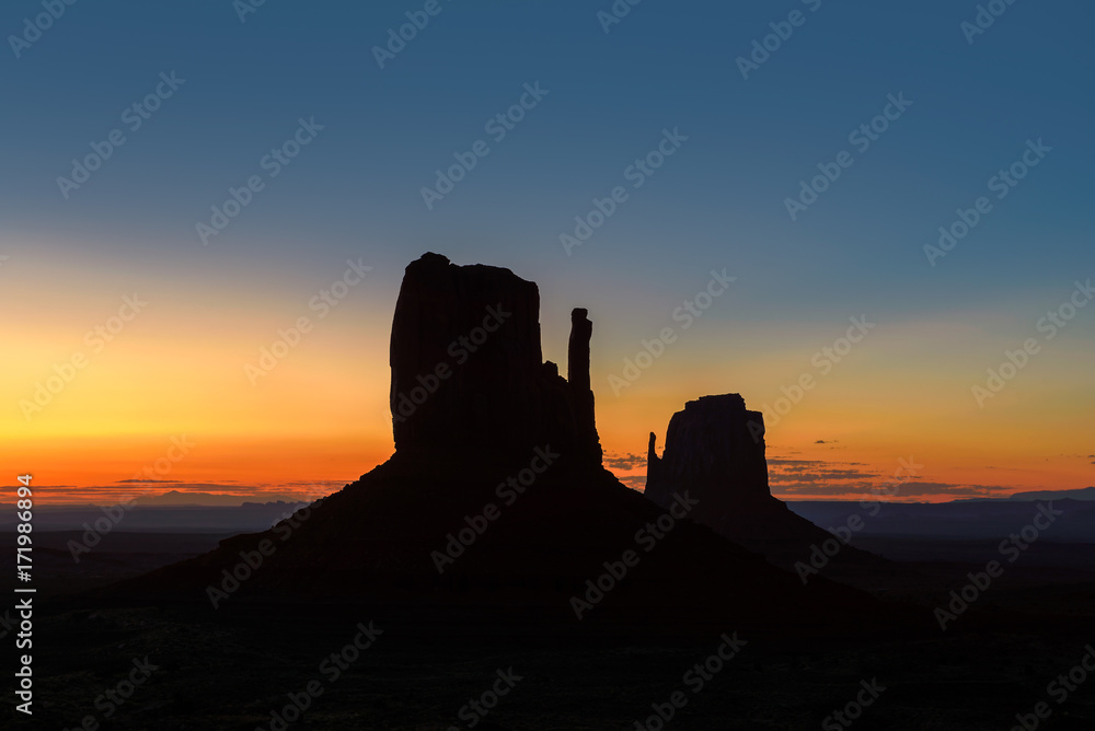 Silhouette of Monument Valley at sunrise,  Arizona.