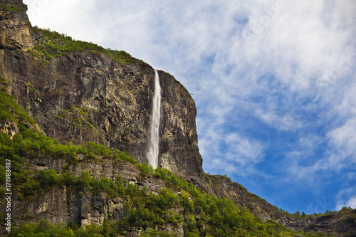 Fjords in Norway, a mountain waterfall.