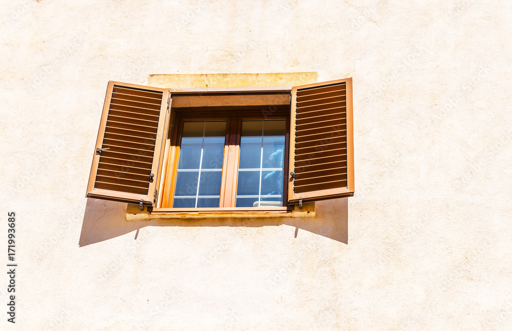 window shutters on an old european style building, architectural decoration old windows, vintage style, a protective element of windows