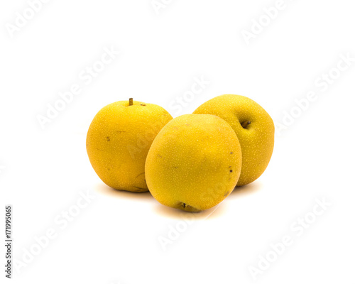 Studio shot three California apple pears (Asian pear, pyrus pyrifolia) isolated on white background. It has the shape and texture of an apple but the flavor of a pear.