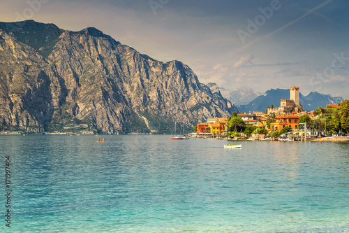 Spectacular Malcesine tourist resort and high mountains, Garda lake, Italy