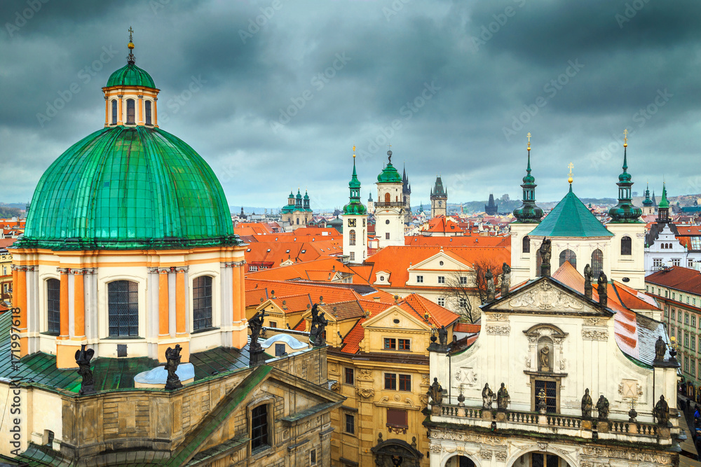 Fantastic Prague cityscape with colorful house roofs and towers, Europe