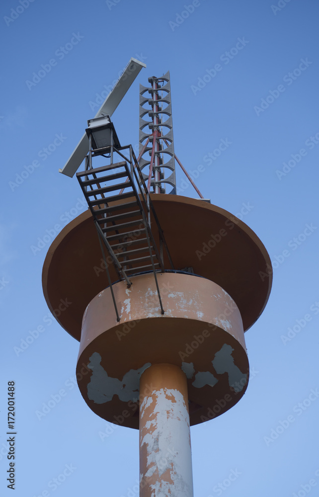 Bottom view of meteorological tower station over blue sky background Bottom view of meteorological tower station over blue sky background