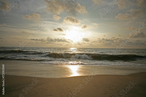 Golden sunset scene on Alleppey Beach, Kerala, India