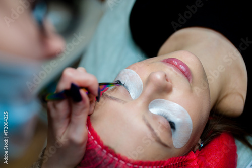 Eyelash extensions in the beauty Studio. photo