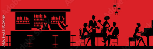 Dinner in the restaurant and celebration. People's silhouettes