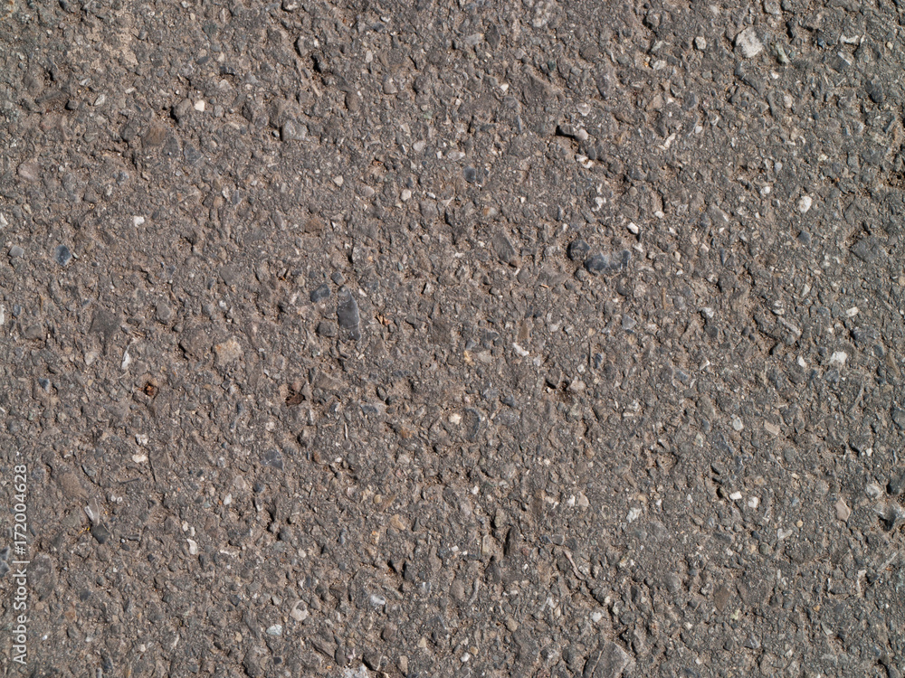 Close up of asphalt on a street, useful as background, texture or many more... Close up of asphalt on a street, useful as background, texture or many more...