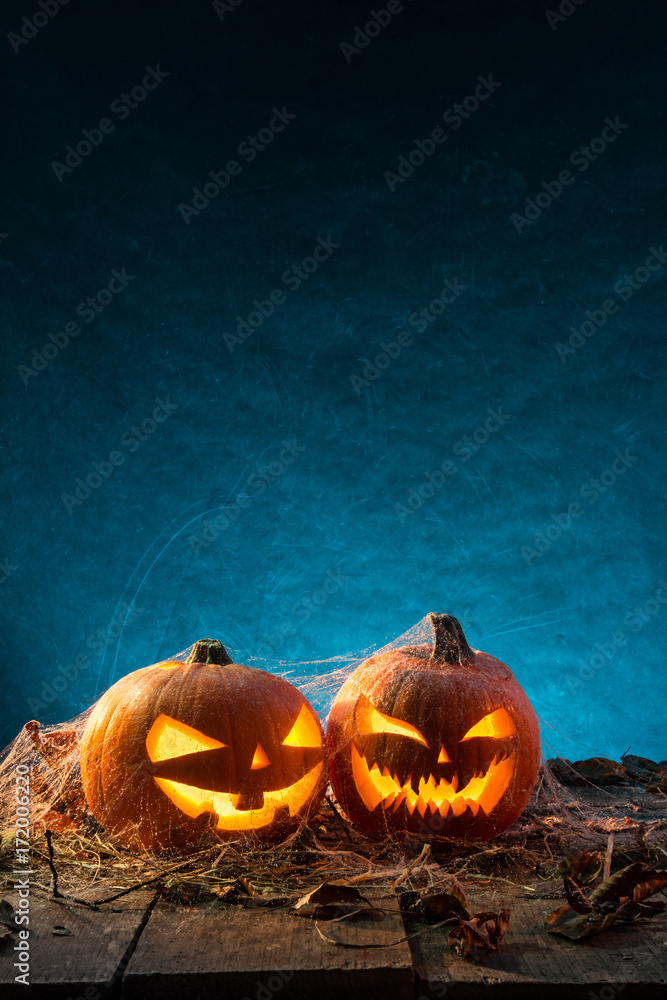 Fototapeta premium Halloween pumpkins on wooden planks.