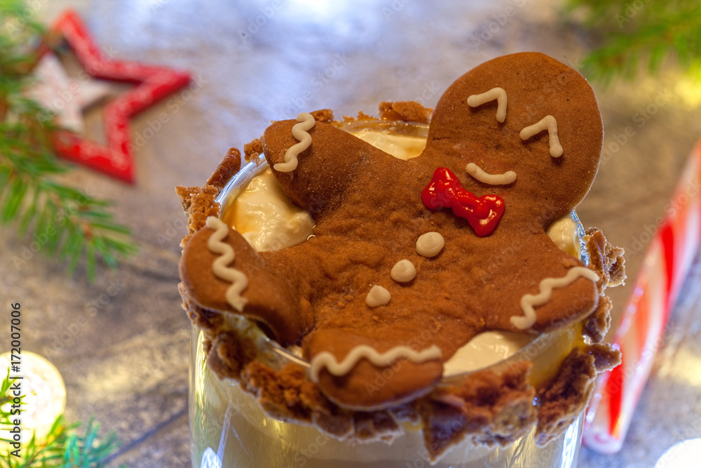 Drunken Gingerbread cookie man in a Christmas cocktail