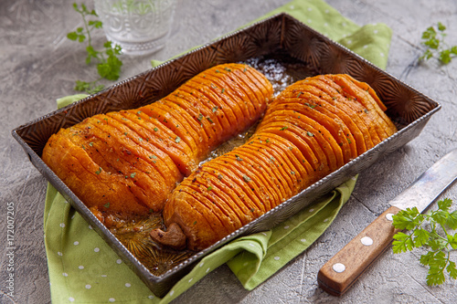 Roasted hasselback butternut squash pumpkin