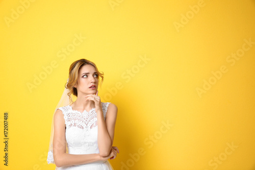 Young beautiful bride on co...