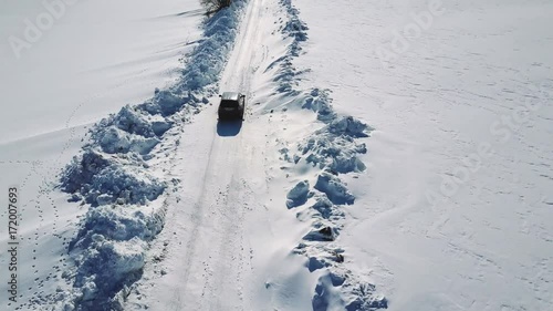 Aerial view of car in winter landscape photo