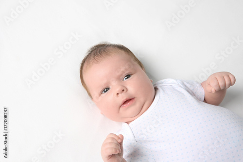 Cute newborn baby on white ...