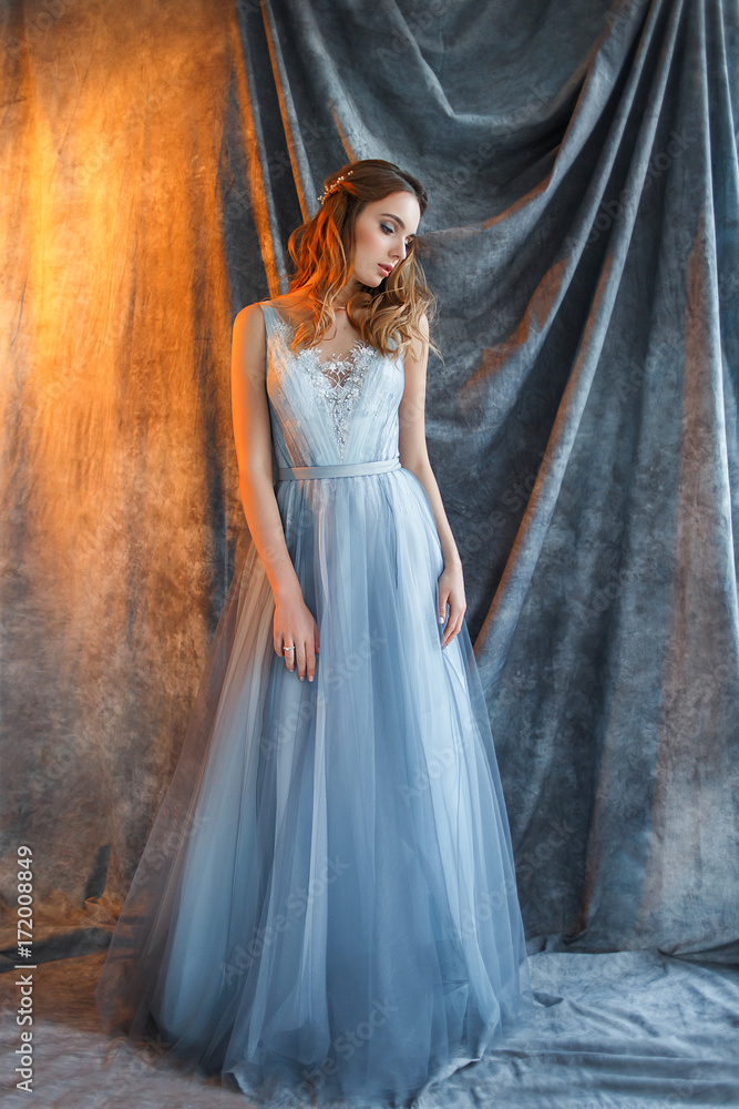 sweet bride in an blue gown