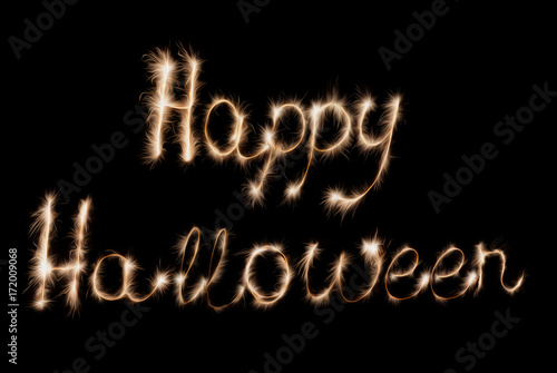Happy Halloween sign sparklers. Illustration on a dark background.
