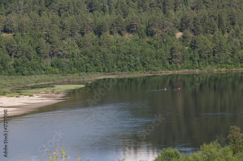 Kayaker on the river Karasjokka near Karasjok, summer photo