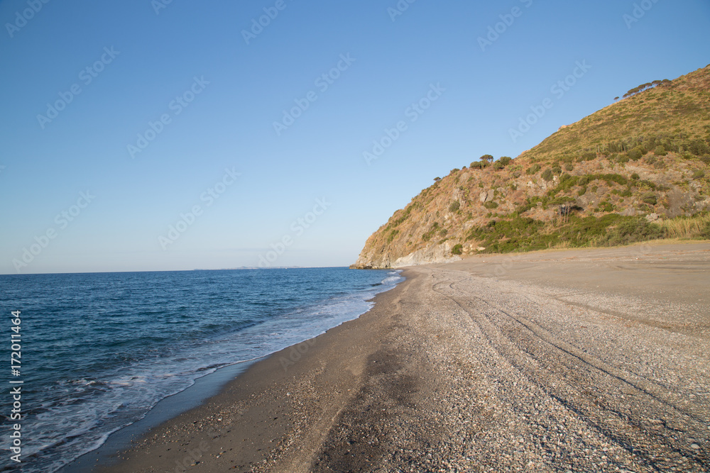 Lonely natural beach in the Nature Reserve Laghetti di Marinello, late spring 