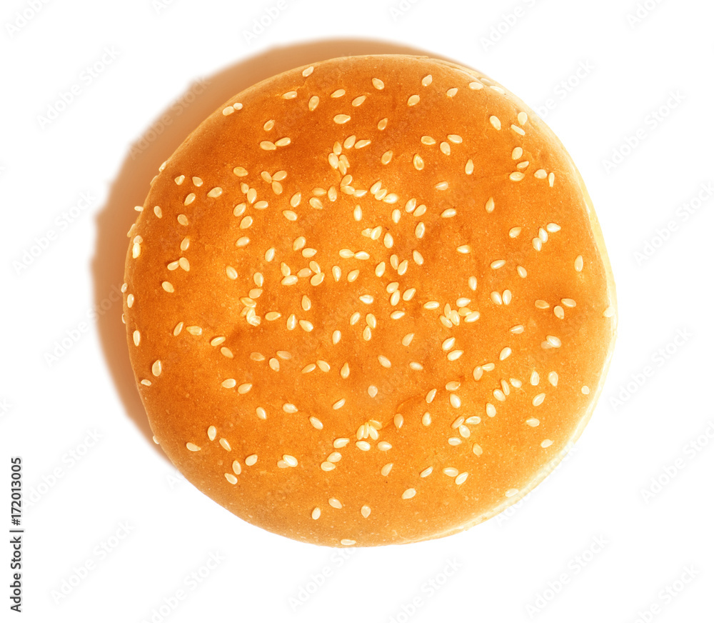 A burger bun with sesame seeds A burger bun with sesame seeds