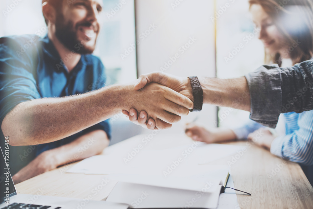 Business male partnership handshake concept.Photo two mans handshaking process.Successful deal after great meeting.Horizontal, blurred background. Business male partnership handshake concept.Photo two mans handshaking process.Successful deal after great meeting.Horizontal, blurred background.